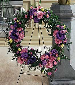 Purple flowers on a grapevine on sale wreath